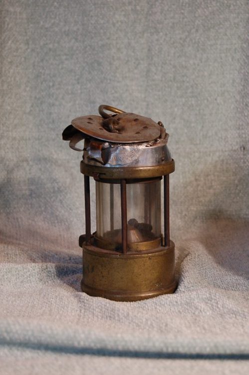 A miners lamp that has been dropped down the pit shaft