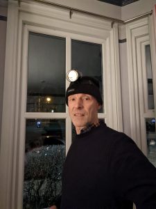 KL2.5 head torch with helmet band on thermal hat