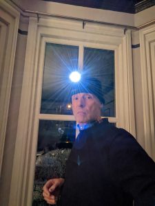 KL2.5 head torch with helmet band on thermal hat